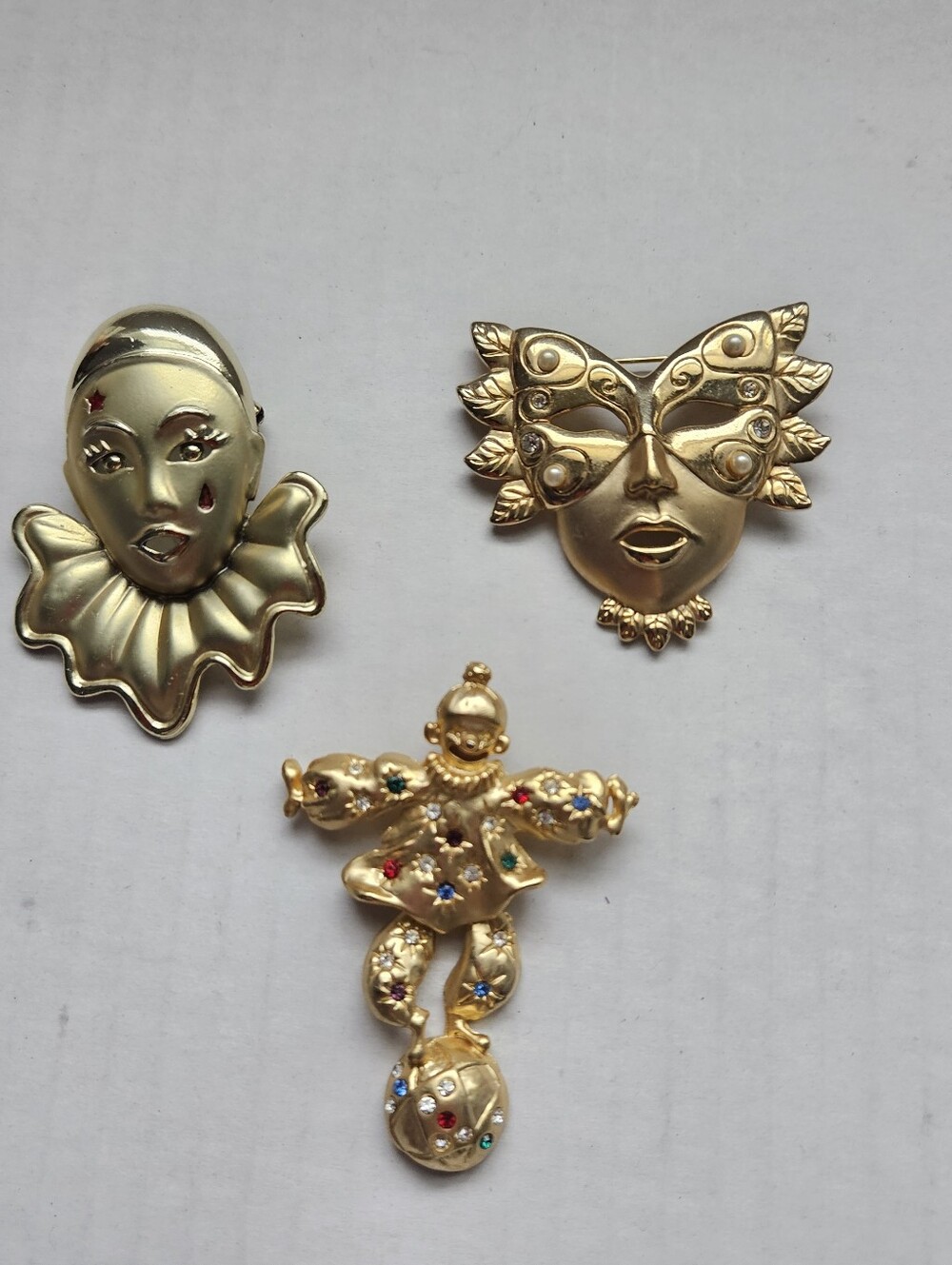Gold-tone Masquerade Face and Jester Pin Trio - 3 Decorative Brooches Vintage